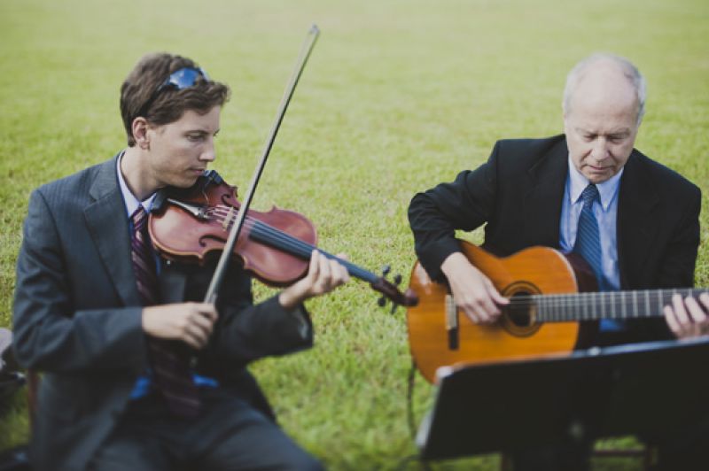 THE CEREMONY SOUNDTRACK: The Williams Duo, a Charleston-based father-son pair, provided music for the ceremony.