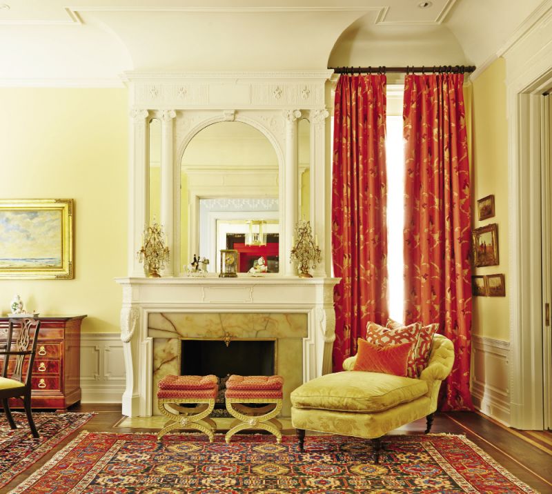 The fireplace surround and mirror are original.