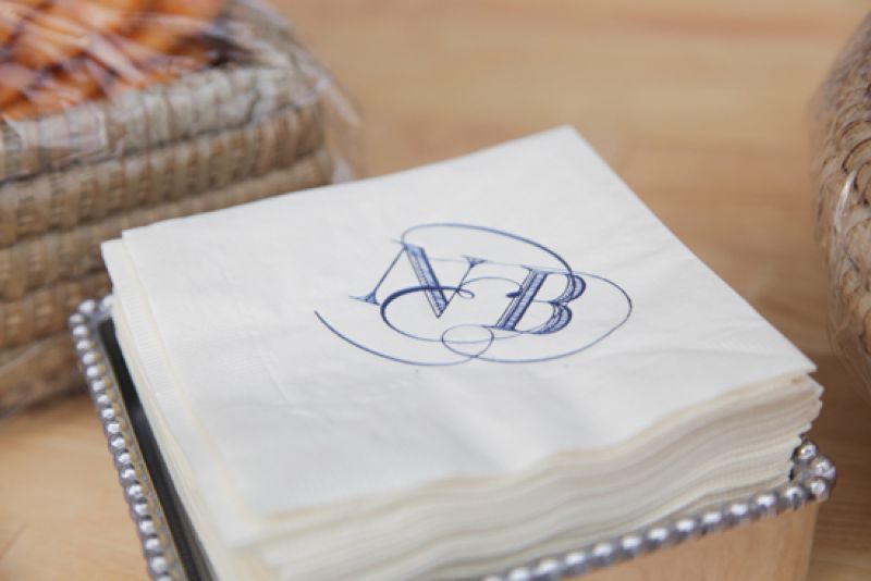 CHILLED COCKTAIL: Perfect for cradling a Mason jar full of sweet tea, the cocktail napkins were also embroidered with the couple’s textured monogram.