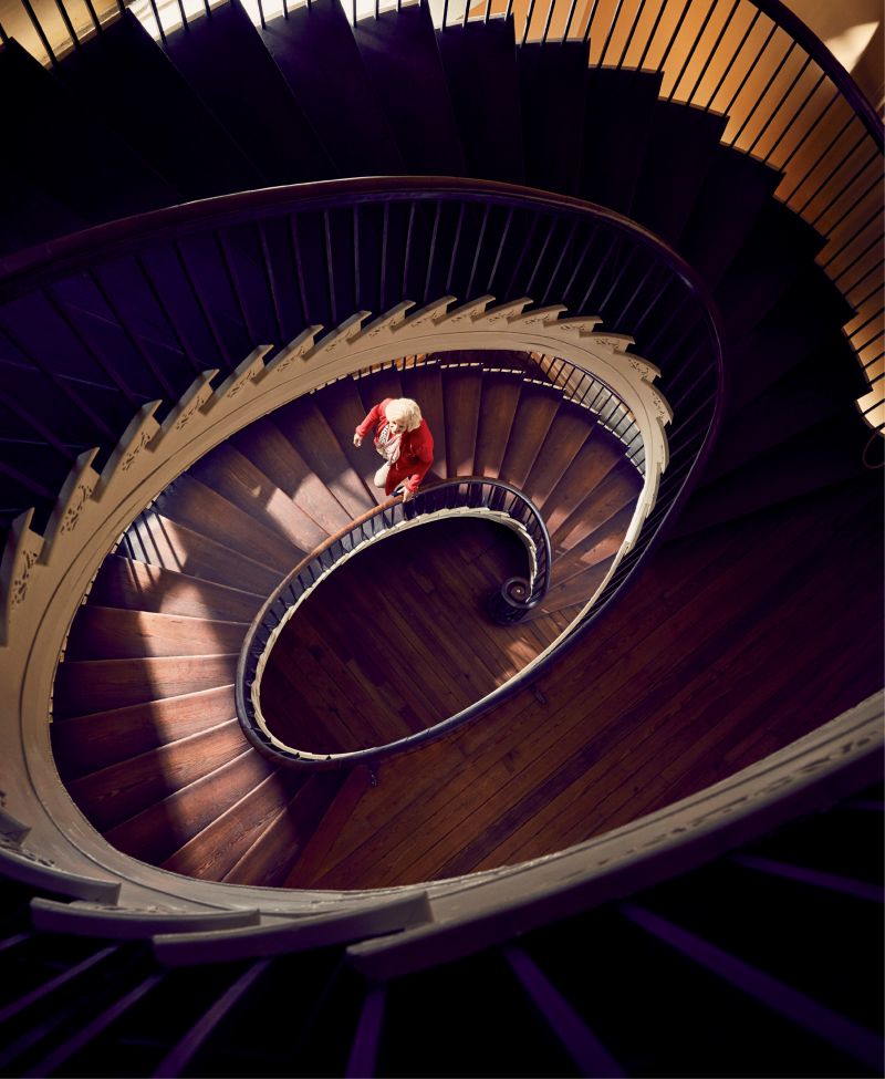 Kitty Robinson on the elliptical, free-flying staircase at Historic Charleston Foundation’s circa-1808 Nathaniel Russell House