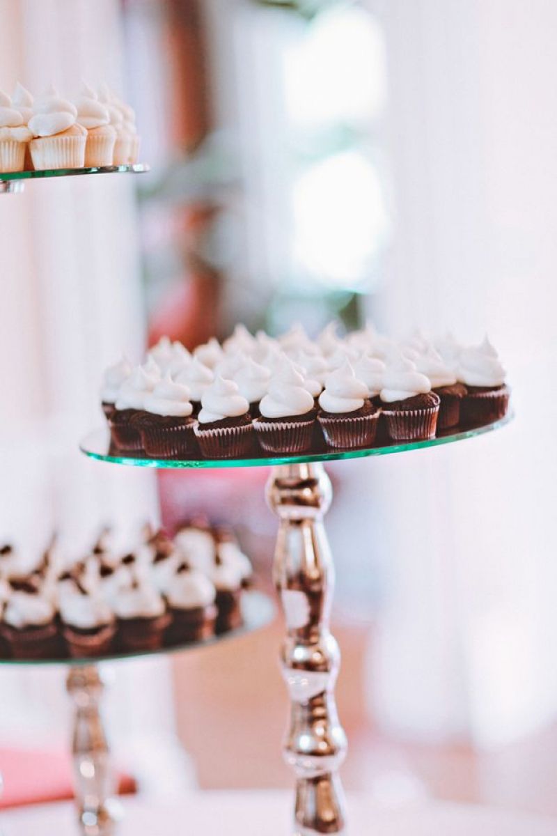 TAILORED TREATS: In lieu of a tiered confection, the King Street bakery Cupcake provided mini cupcakes for the dessert spread.