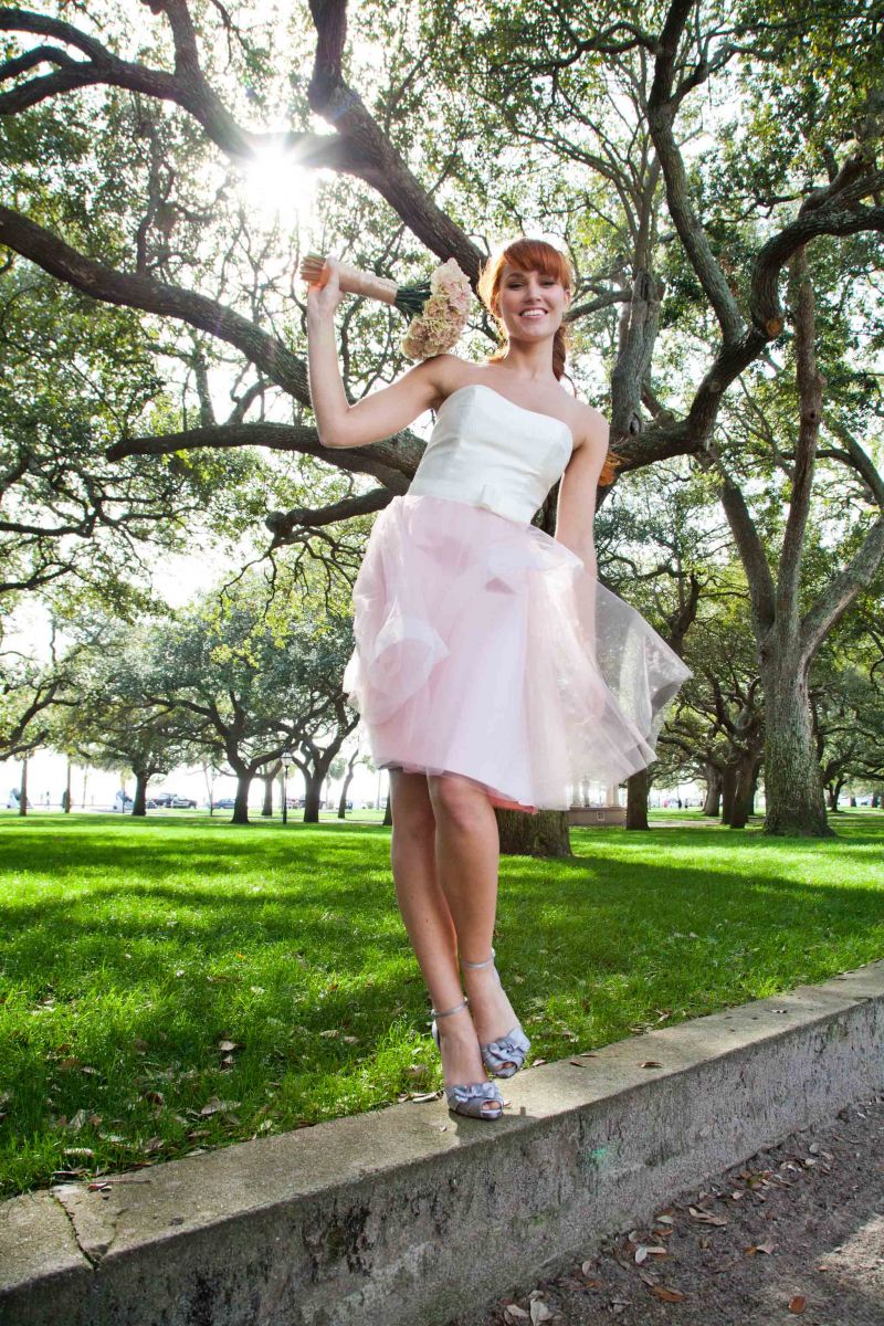 FOOTLOOSE: Alvina Valenta’s two-piece satin bodice and tulle skirt from Jean’s Bridal. Rhinestone and ribbon headband from Out of Hand. 14K ring with diamonds and 4.17 ct. rose amethyst from Croghan’s Jewel Box. Nina’s d’Orsay heels from LulaKate.