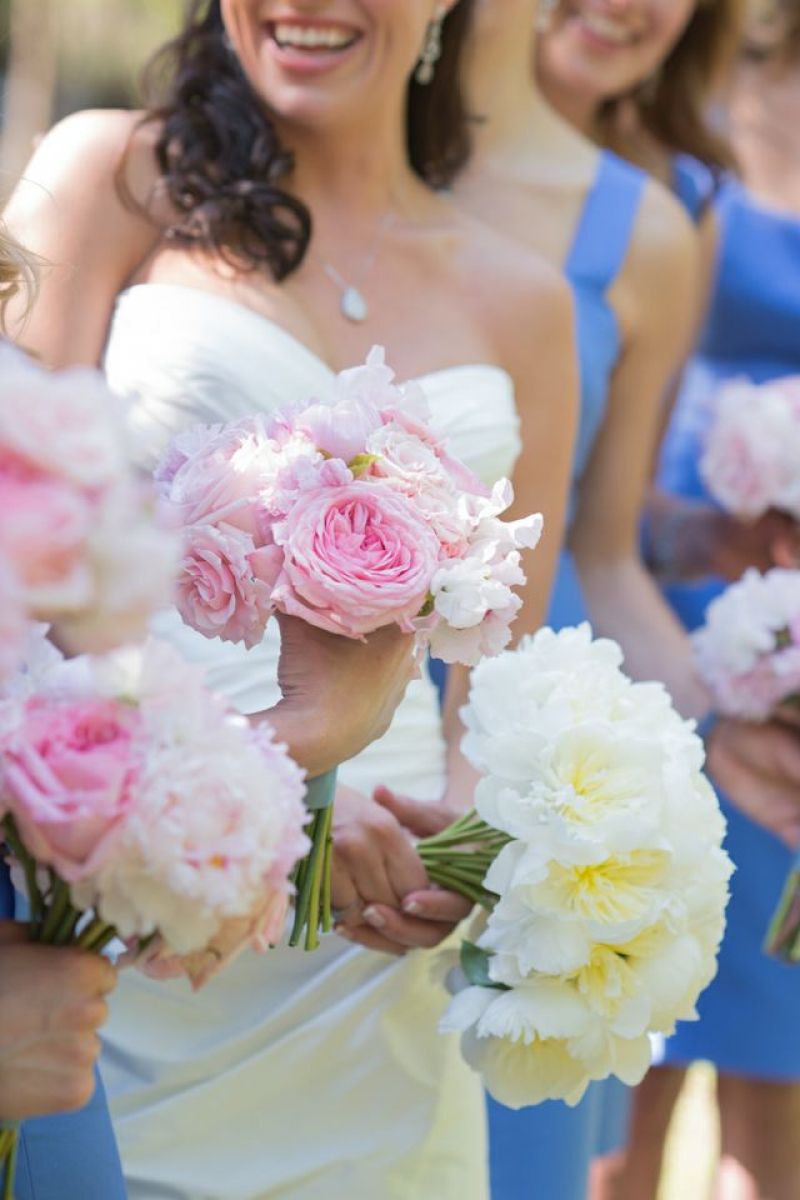 FOLLOW YOUR HEART: Dressed in a Romona Keveza gown, D’Anne wore a necklace of diamonds passed down from her grandmother Ma, whose wise words (“Love isn’t convenient; you have to go where your heart is”) finally convinced D’Anne to follow after Patrick. Charleston florist stems arranged bouquets of white and pink peonies for the bride and bridesmaids.