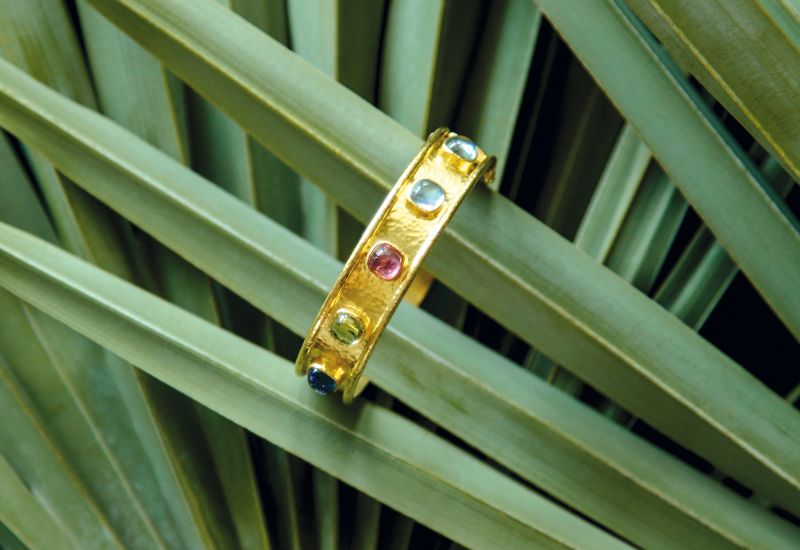 Elizabeth Locke 19K yellow-gold “Tutti Frutti Studded Bangle,” $8,550 at Croghan’s Jewel Box
