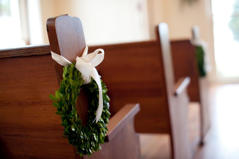 EASY DOES IT: For ceremony décor, Sue fashioned wreaths from boxwood leaves.