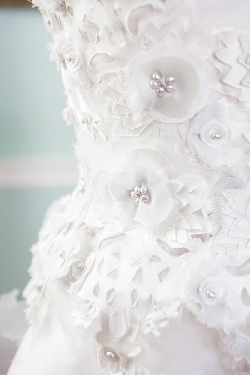 The handcut details on the corset give a lacey look to the fabric.