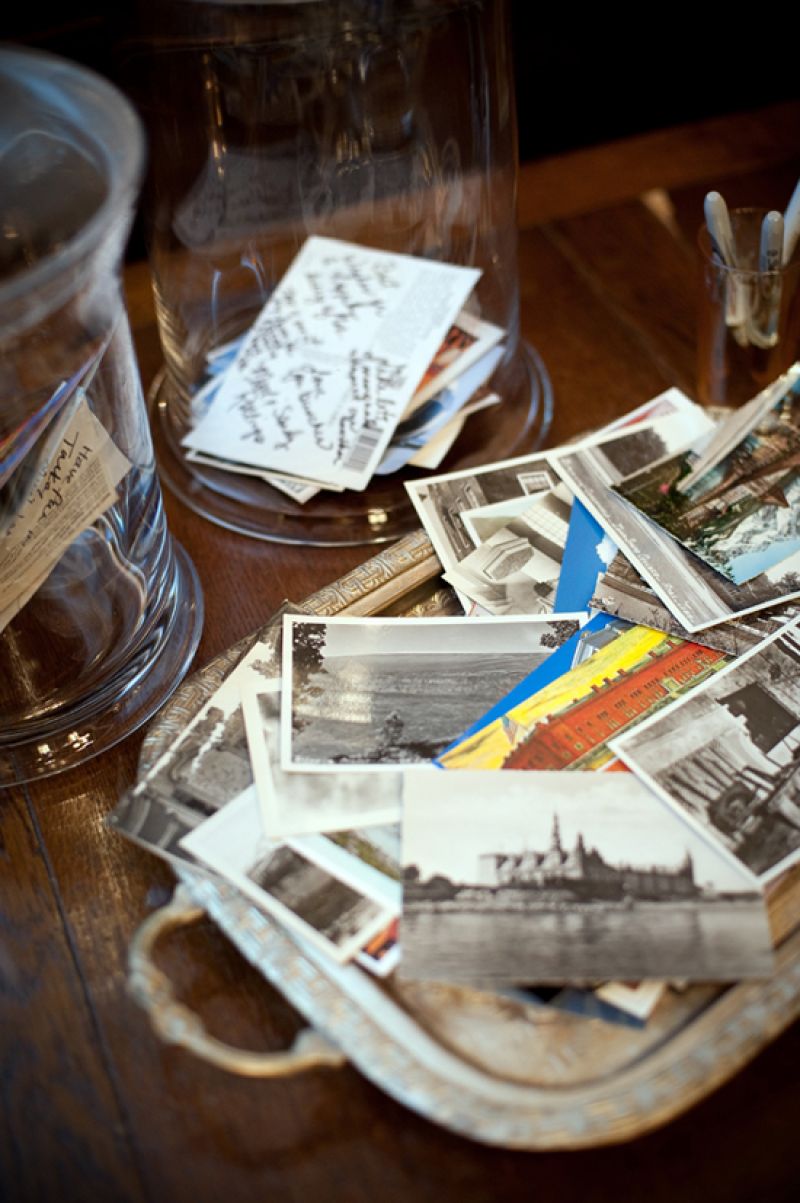 DON’T FORGET TO WRITE: In lieu of a traditional guest book, family and friends signed their well wishes for the couple on postcards collected from Lyndsey and Brian’s travels.
