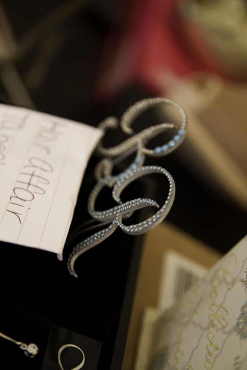The big accessory find of this issue? These killer monogram hair pins from Charleston’s own hairstylist Tanesha Dupree. We saw them in a show for Maddison Row and Bella Bridesmaid, and asked for them for the shoot. Perfect for “something blue!” To order, visit her site, <a href="http://www.affairhairbytanesha.com">www.affairhairbytanesha.com</a>.