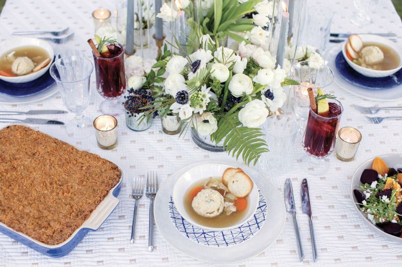 The meal begins with matzo ball soup and roasted beet salads.