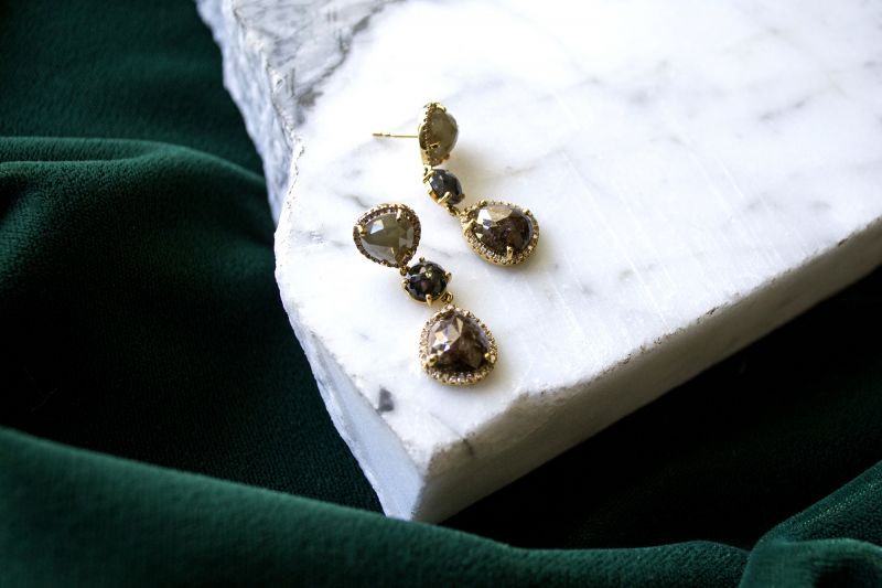 Royal Jewelry 18K white-gold and 19 ct. sapphire earrings, $7,350 at Diamonds Direct