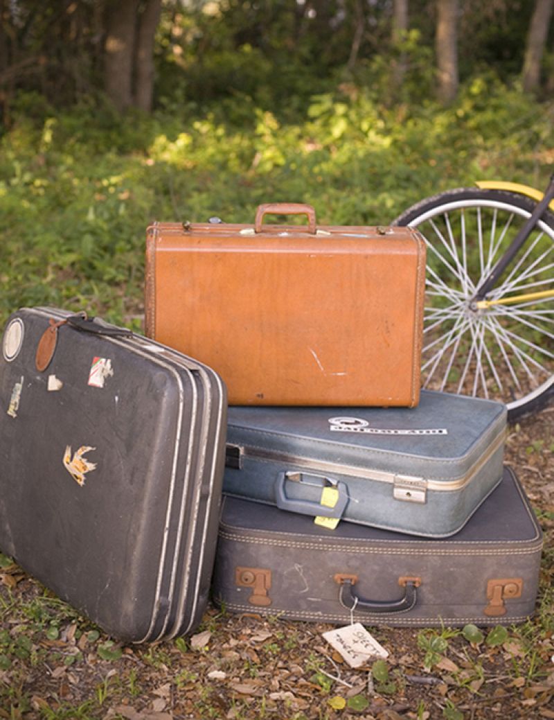 ALL PACKED UP: Adding color and sentiment to the outdoor venue, suitcases Benjamin’s grandfather used in the Navy were stacked near the entrance.
