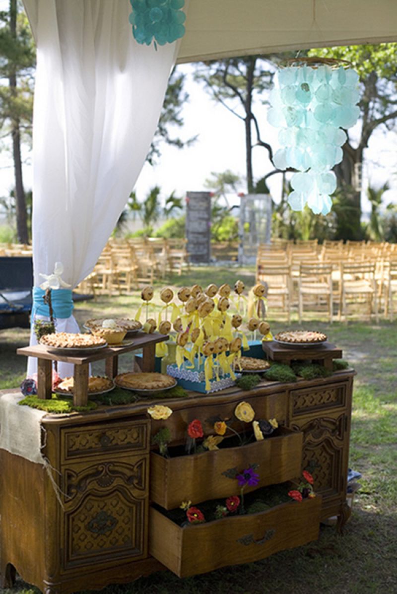 ANTIQUE ROADSHOW: The dessert spread sat atop a vintage credenza the bride and groom found for just $35 at a thrift store.