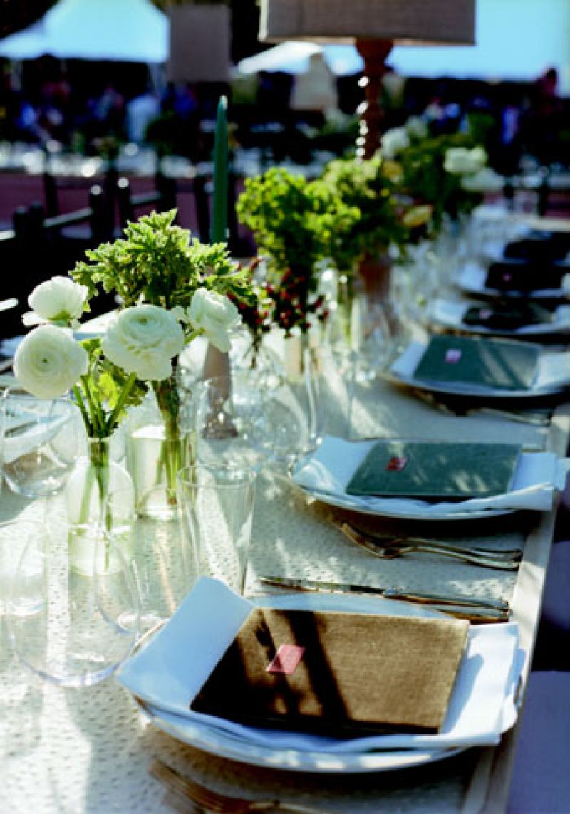Field Feast: After Graham tasted Susan Mason’s fare at a family friend’s wedding, the couple brought the Savannah-based caterer to town to create a seasonal menu of rack of lamb with Madeira and mint sauces, jalapeño cornbread, and butterbean salad (Candice’s favorite). Each velvet-covered menu bore a copper plate with a guest’s name and acted as a place card.