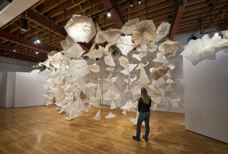 Jocelyn Chateauvert  (<a href="http://www.jocelynchateauvert.com">www.jocelynchateauvert.com</a>) Paper in Bloom, 2014, handmade abaca paper, 14 x 52 x 6 feet, approximately 200 paper morning glories, ranging in size from 14 inches to 6 feet in diameter
