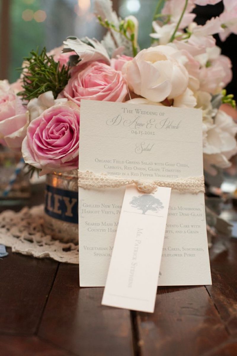 SOFT-SPOKEN: Dodeline design fashioned neutral-toned menus and escort cards with doily lace ribbon.