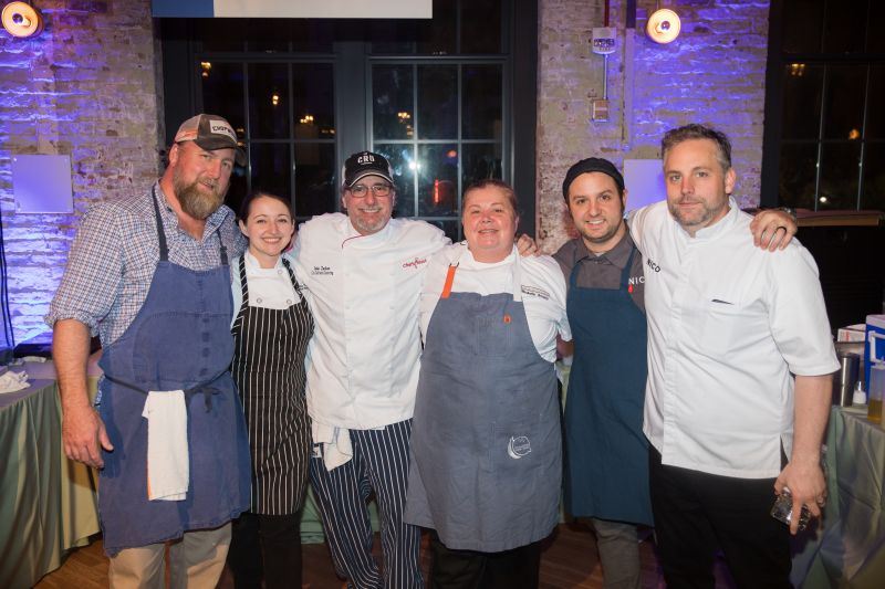 Harleston Village chefs, including Patrick Owens, John Zucker, Michelle Weaver, and Nico Romo, pose for a photo.