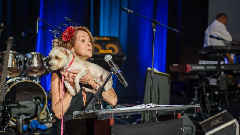Charleston Animal Society board member and 2022 gala chair Gerri Greenwood addressed the crowd with Pico.
