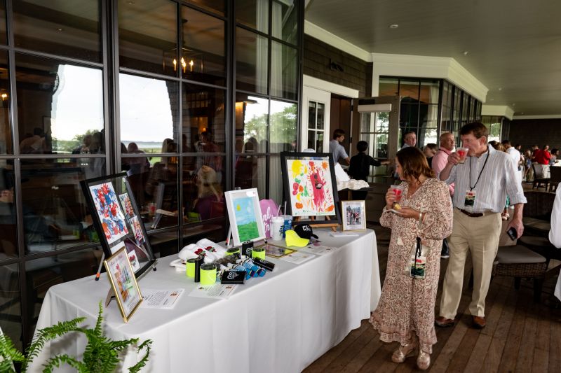 An auction table at the Kiawah Island Club’s River Course Clubhouse