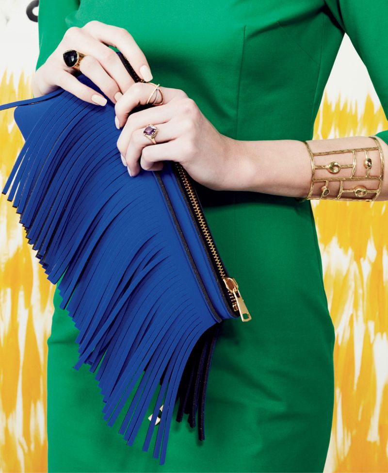 Moschino “Dinosaur” dress, $650 at Christian Michi; brass double-knot earrings, $130 at Hidden Countship; and Lanvin pumps, price upon request at RTW.