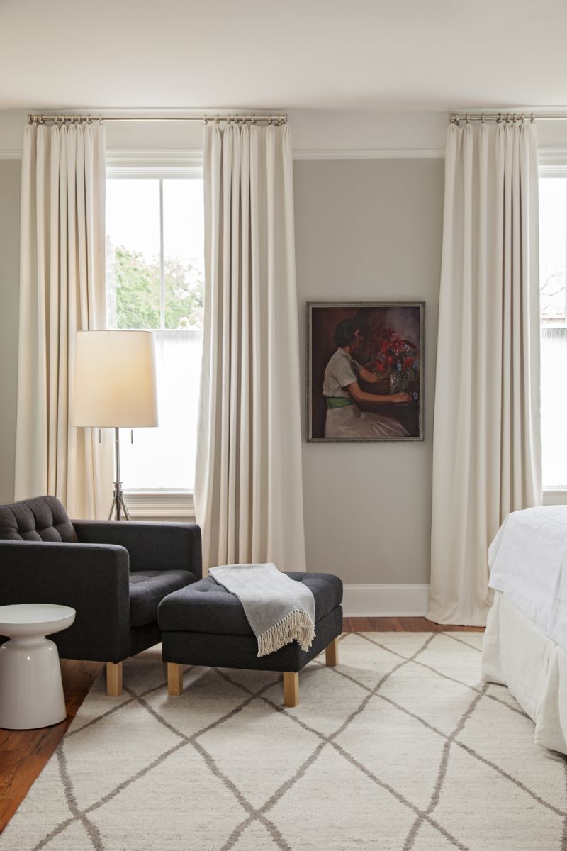 A Piece of the Past: A portrait of Lauren’s great-grandmother adds personal flair to the master bedroom.