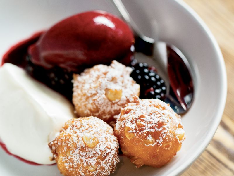 Decadent dish: Sweet corn fritters with blackberry coulis and whipped mascarpone