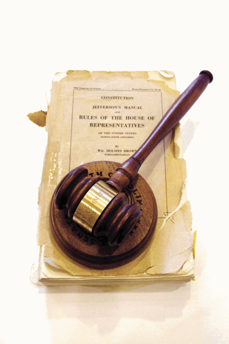 in his new office, this gavel rests atop his dog-eared copy of Jefferson’s Manual, which he has used for more than 30 years. Photograph by Caroline Tan