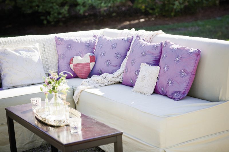 PILLOW TALK: Lounge pieces from Loluma took on a homey vibe when topped with mix-and-match pillows of varying shapes and materials.