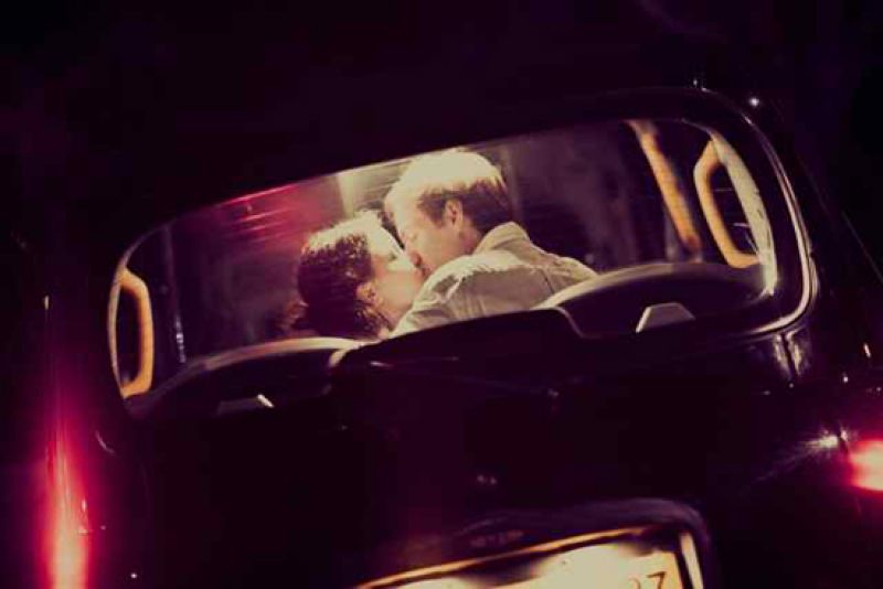 A KISS GOODNIGHT: Guests tossed sprigs of lavender on the newlyweds just before they jumped into their getaway car.