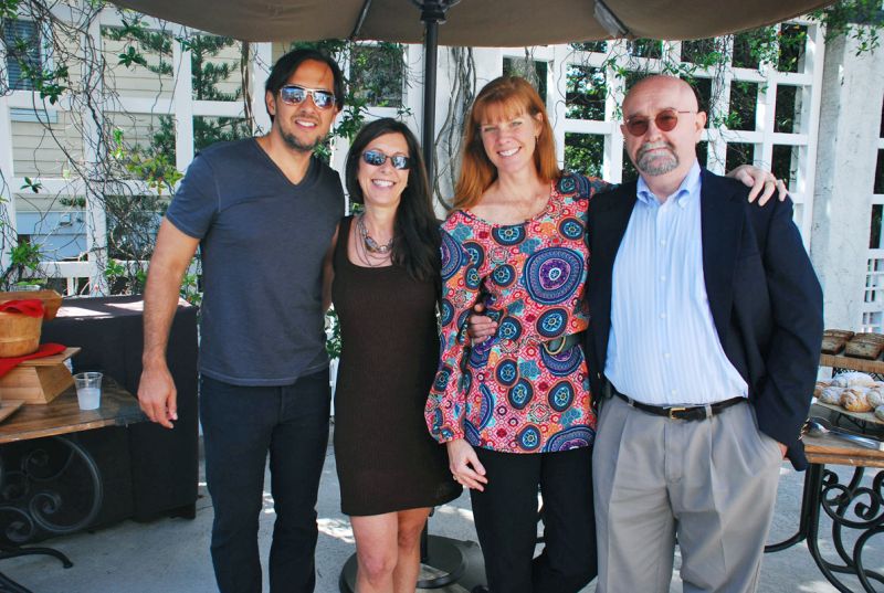 Gil and Susan Aviles next to Tiffany and Steve Takacs