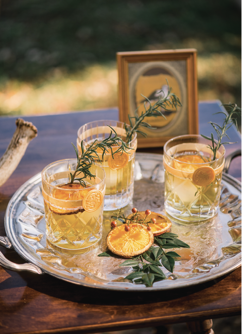 The guests mix drinks from mini bottles of Bourbon and ginger ale and ...