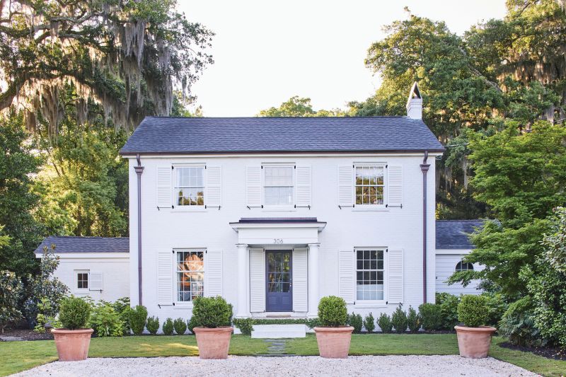 Living Large: Working with Birmingham-based architect Jimmy Laughlin upped the Georgian charm of the circa-1950 home. “Scaling the windows a little larger made a huge difference for the proportions of the house,” says Cooper.