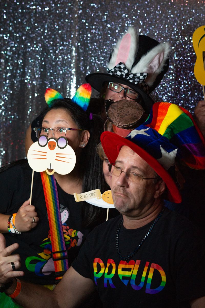 Yumi, Frank, and Lori snap a group shot at the photo booth.