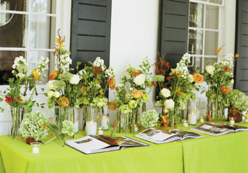 WRITE OF PASSAGE: Candles and floral  arrangements lent a “gorgeous and inviting” air to the book-signing station, says Tyler.