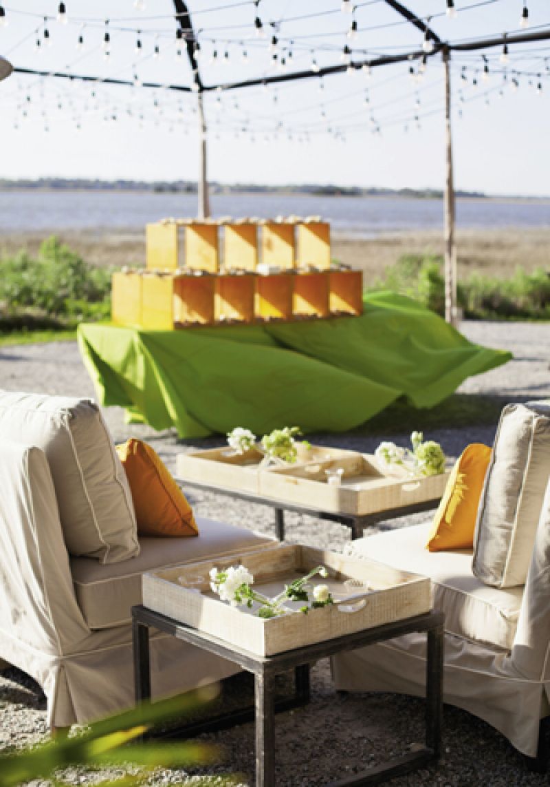 HOW APPETIZING: Calder created a waterside lounge with orange cubbies offering small plates of cheese and charcuterie for guests.