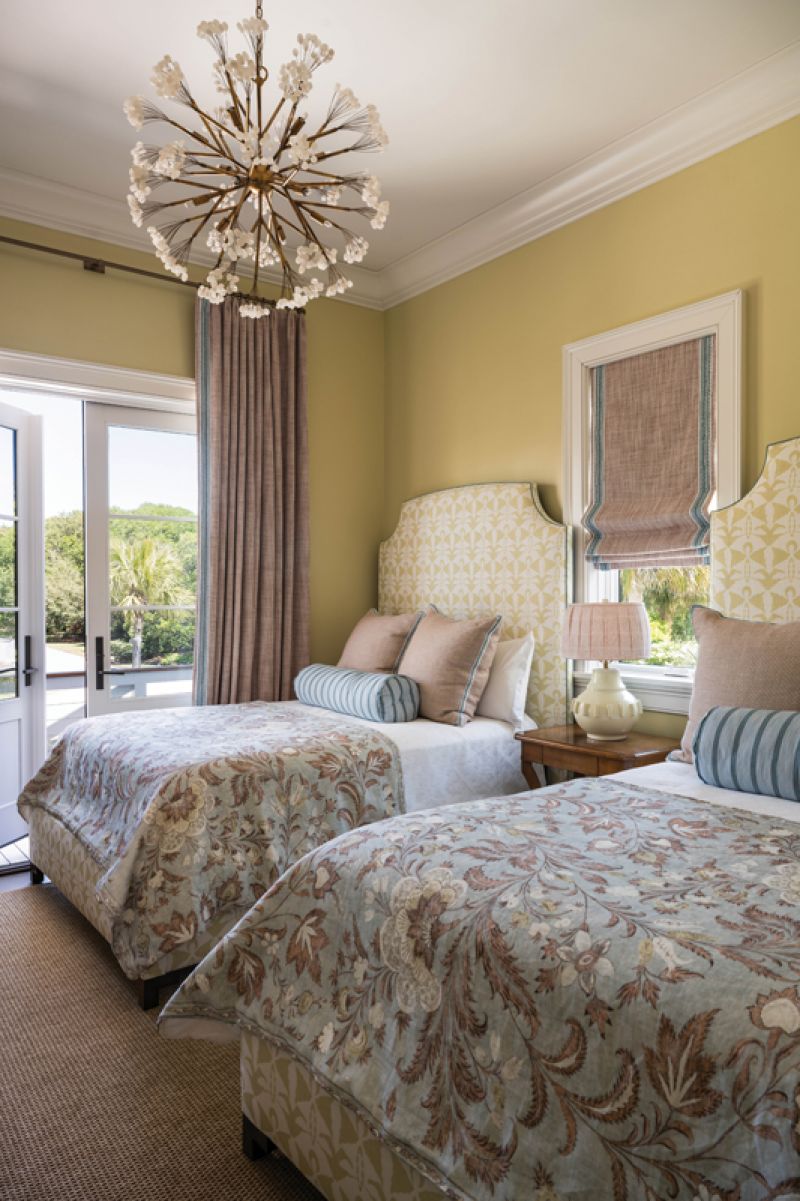 The downstairs guest room is a feminine space designed for when Susan’s girlfriends come to stay. The pretty paisley fabrics and Benjamin Moore “Sesame” wall paint create a fun, retro aesthetic.