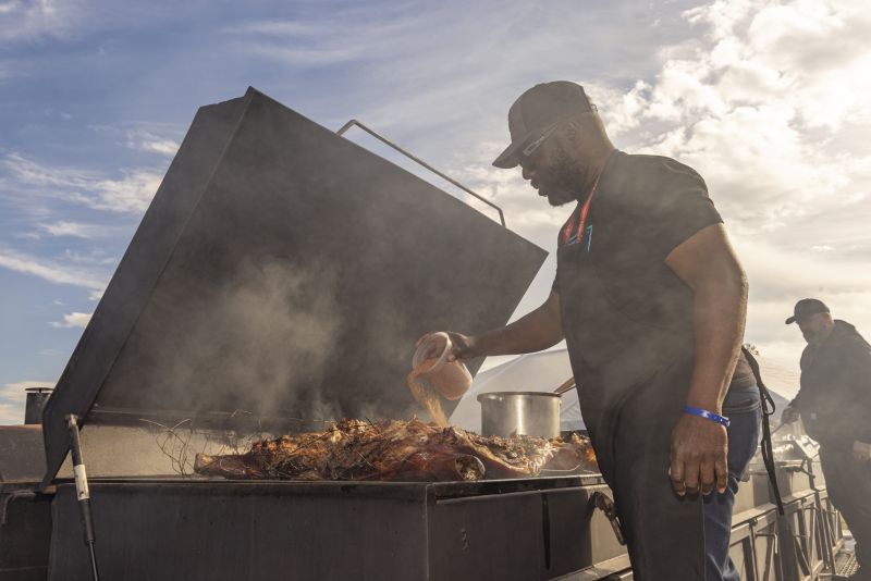 Known for all things porcine, pitmaster Rodney Scott tends to the prep of whole-hog bbq.