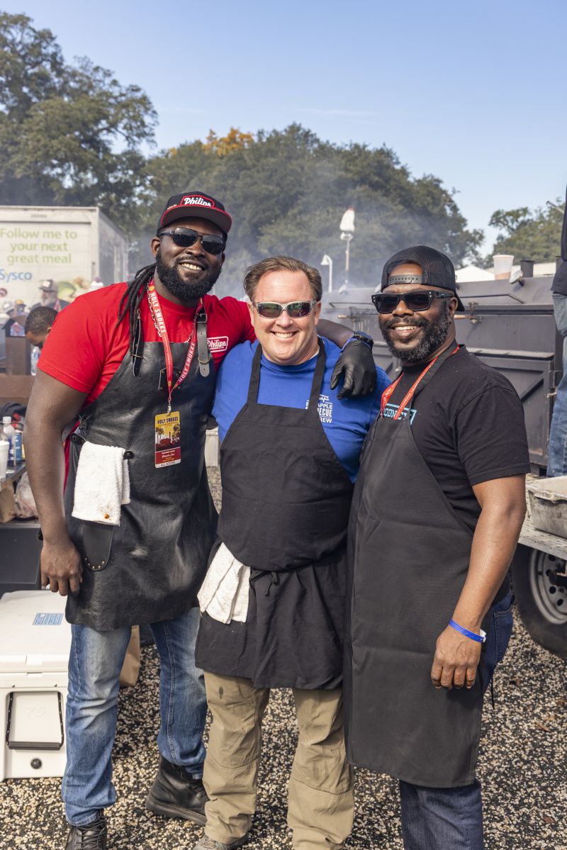 Pitmasters Rasheed Philips, Bill Schroder, and Rodney Scott manned smokers in the Traditional Village.