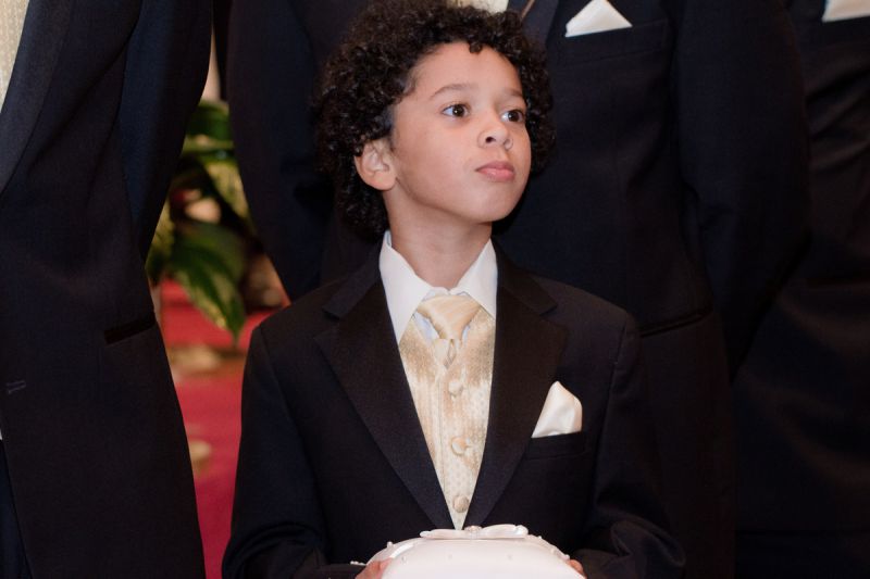READY AND WAITING: The bride grew up going to Mount Moriah Missionary Baptist Church in North Charleston. At her wedding, ring bearer Liam stood ready at end of the venue’s aisle.