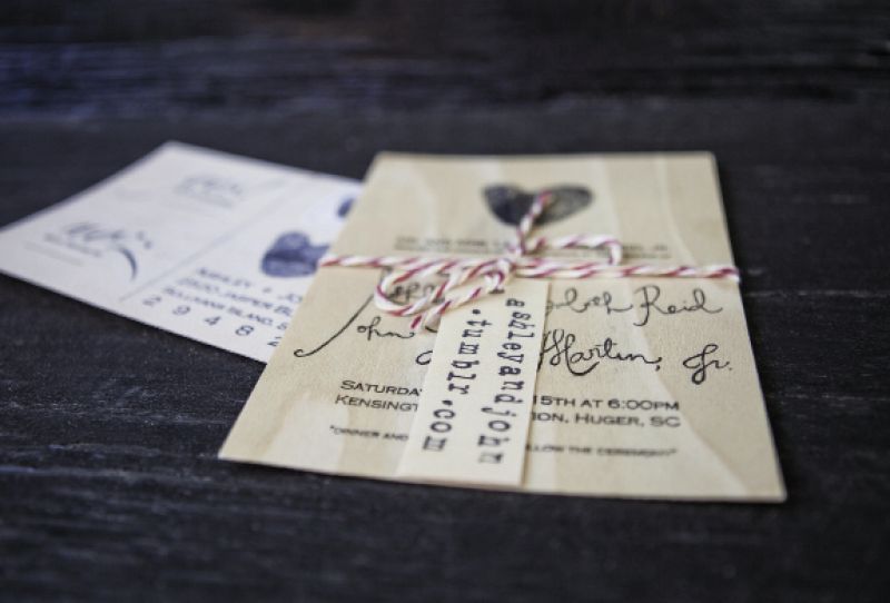 THUMBS UP: Ashley hand-stamped a heart (formed by her and John’s fingerprints) on invitations made from sheets of sycamore wood veneer and tied with baker’s twine.