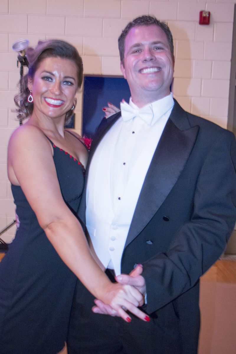 Marina Fridmanovich and Matt Orosz cheese for the camera.