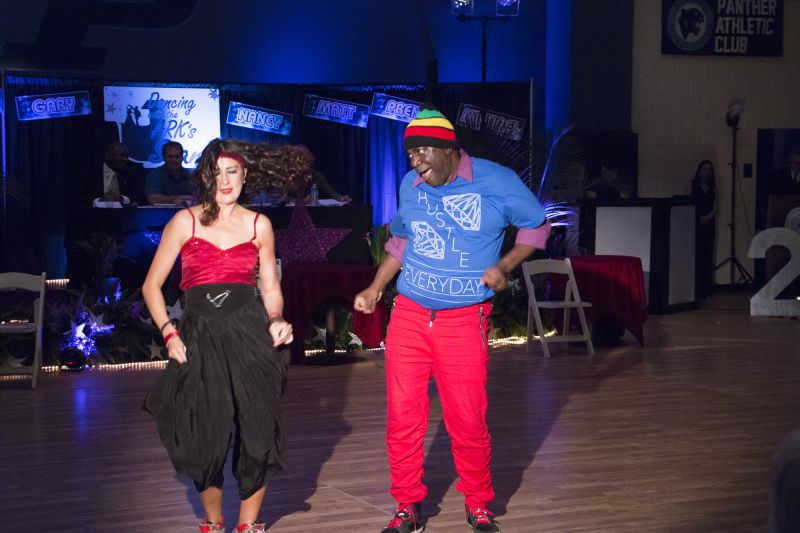 Dancer Anya Kwan and Pren Woods of Alston Middle School do the hustle.