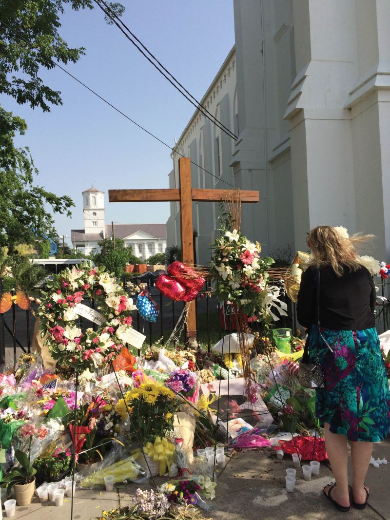 In this photograph taken on June 24, 2015, the steps of Mother Emanuel demonstrate the collective outpouring of grief for the victims, survivors, and their families in the days and weeks after the tragedy.