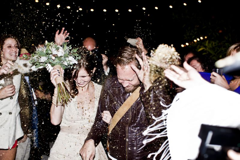 SAYONARA: Friends and family saw the newlyweds off by tossing dried chamomile and lavender, provided for them in miniature burlap sacks.