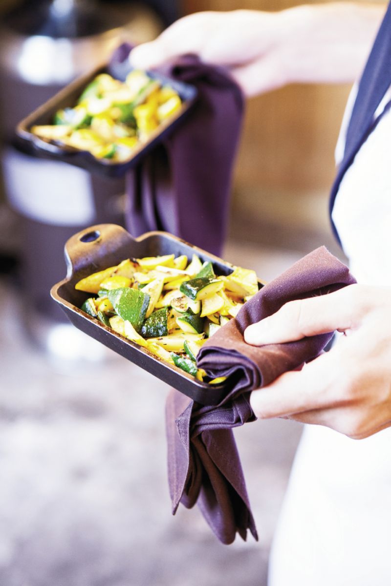 SHARE ALIKE: Passed dishes on the restaurant’s back patio set a laid-back tone for the weekend.