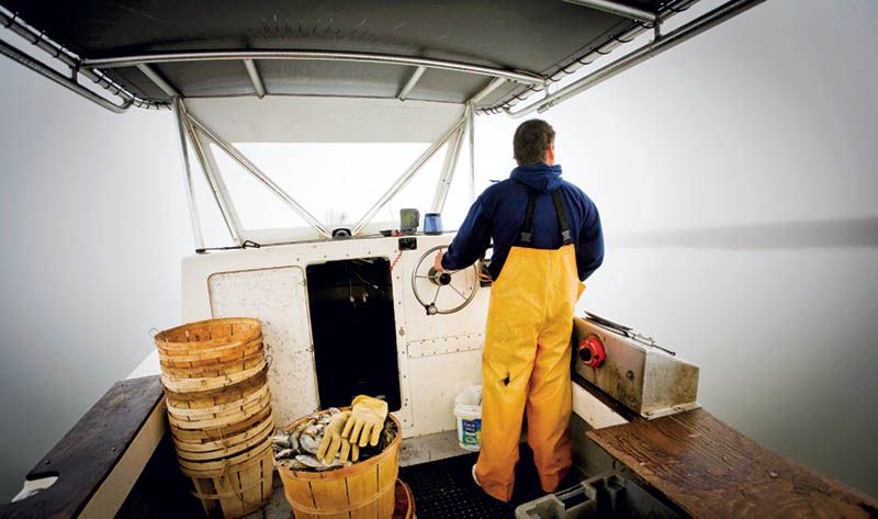For the photo essay “The Watermen” (November 2009), Wilson photographed crabber Todd Bonney on the Wando River.