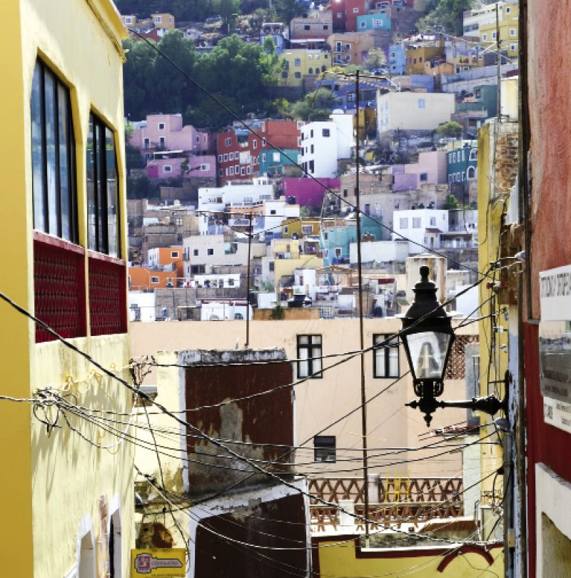 A view to residential neighborhoods that cover the hillside and valley