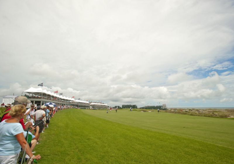 Fans lining the 18th fairway.