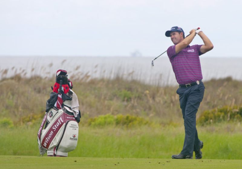 Padraig Harrington&#039;s second shot on 18 with sea oats and shrimp boat.