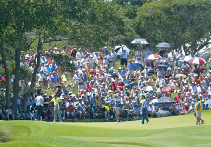 Tiger and Keegan Bradley shake hands after finishing their rounds with some great scores.