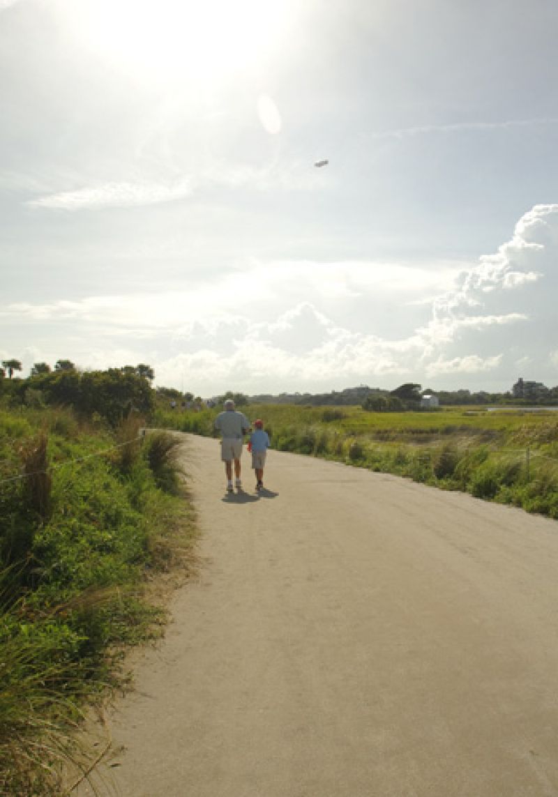 Taking a nice walk with Dad under a blimp.